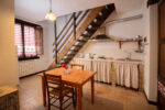 Italy Abruzzo Torre Mannella apartment stables livingroom kitchen